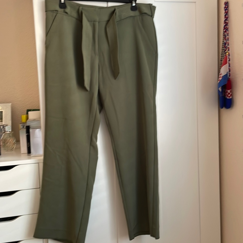 Olive green slacks, with pockets. Size 8